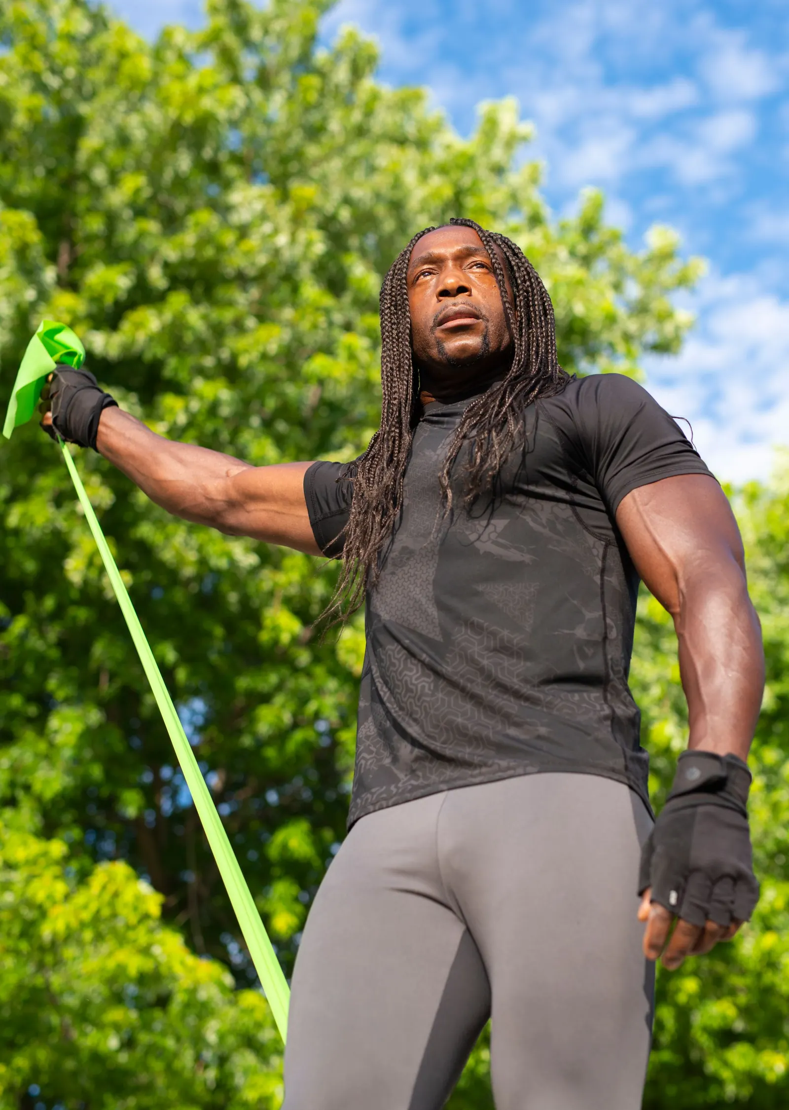Athlete training with a resistance band outdoors